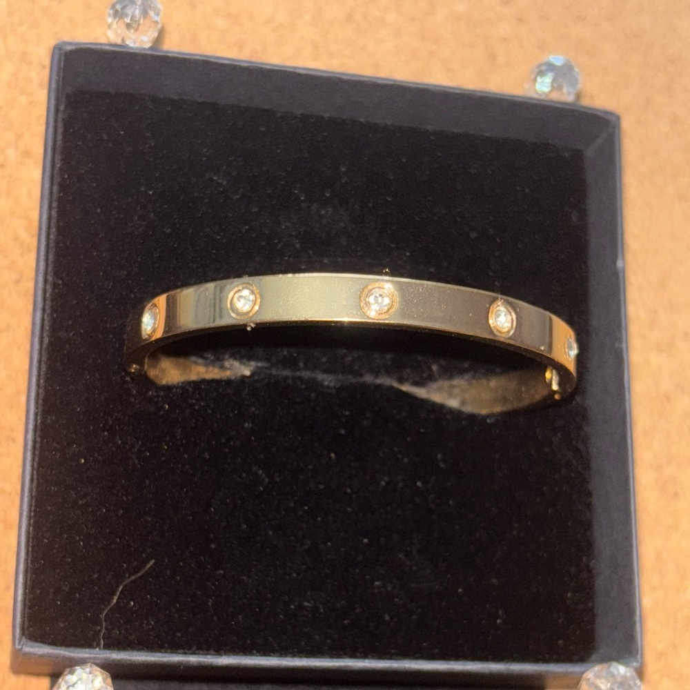 Elegant Gold Bangle Bracelet with Crystal Accents